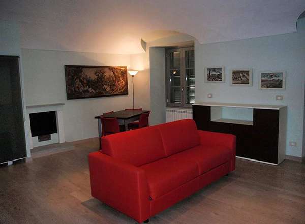 progetto restyling monolocale zona pranzo divano